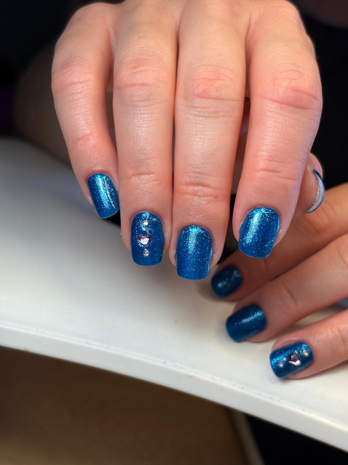 Russian manicure BIAB and colour in blue with glitter and gemstones at Queen Bee Nails in Rockingham WA